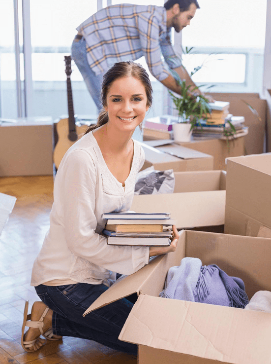 couple unboxing after kelowna movers helped move best kelowna moving company