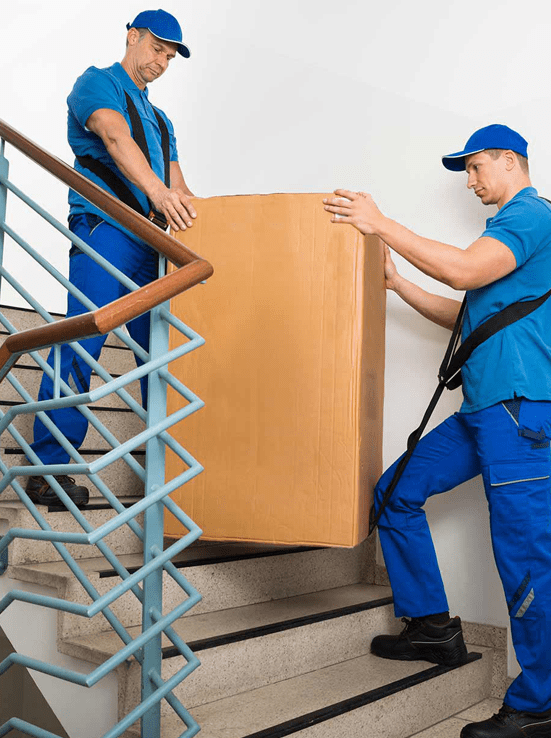 chilliwack movers carrying a box down a flight of stairs chilliwack moving company